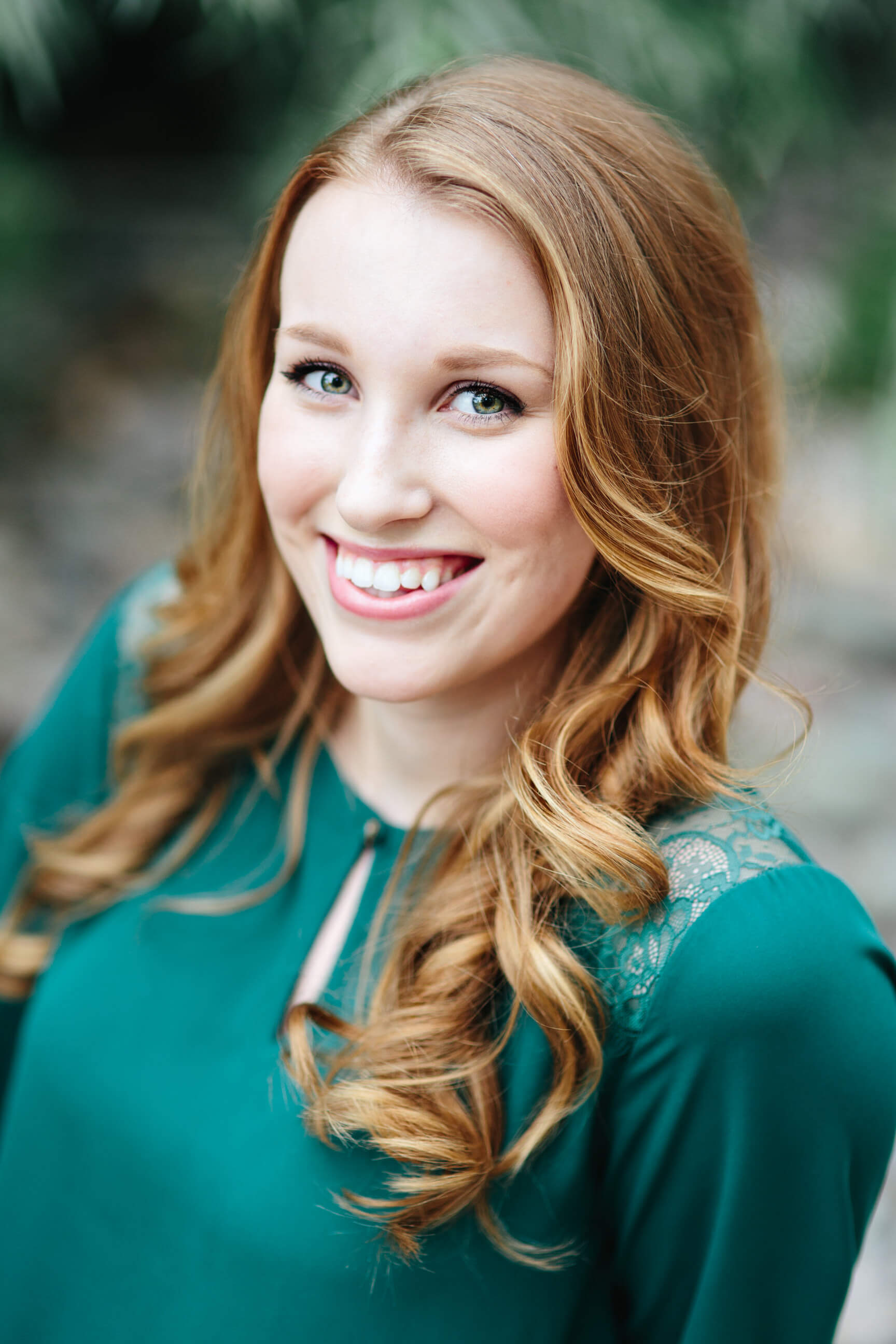 A woman smiles for her Missoula headshots