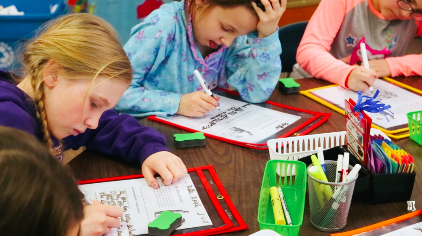 School children work on their writing at Ladysmith Elementary School in Ladysmith Wisconsin using Ladysmith Edcuational Enrichment Fund donated supplies