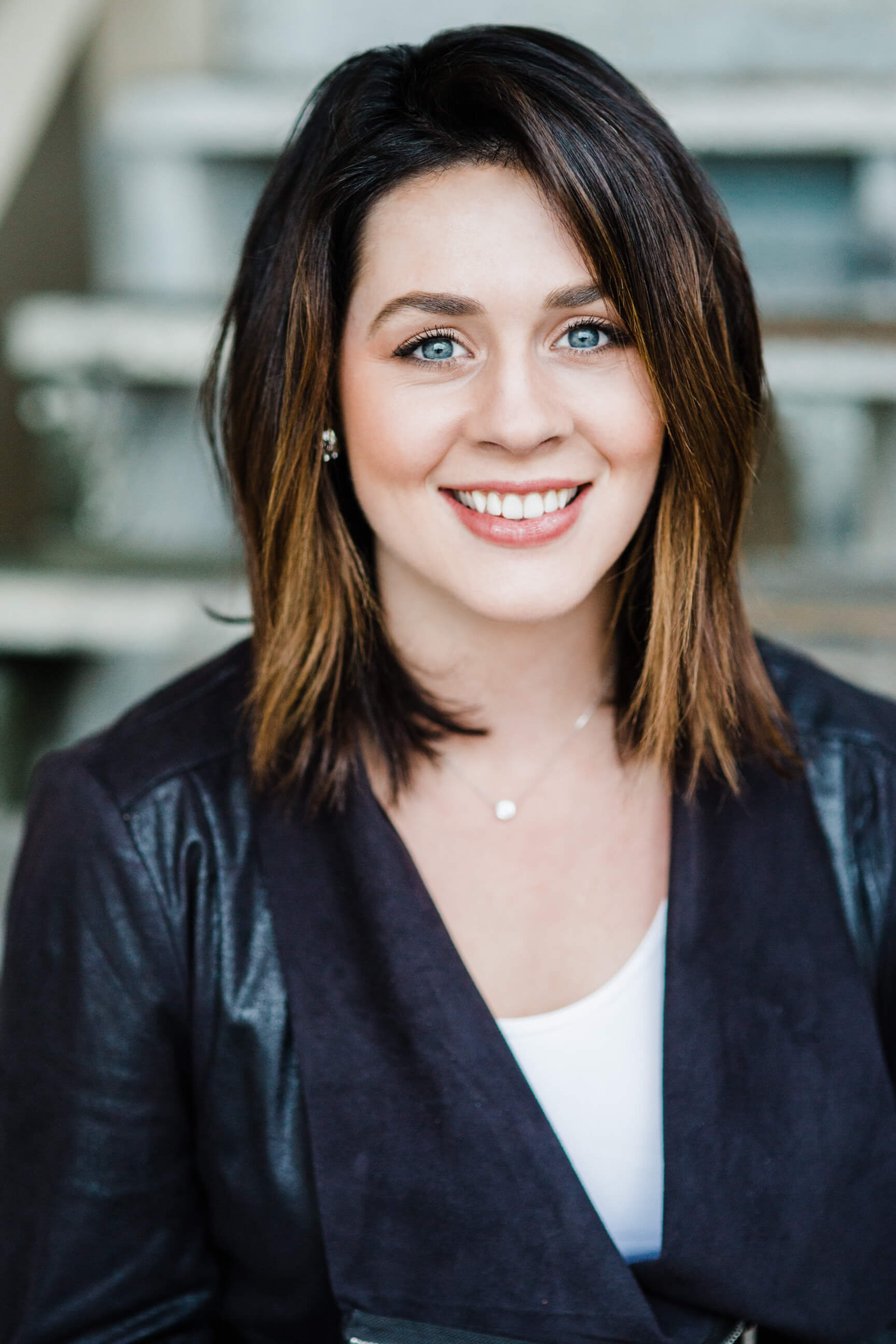 A business woman poses for her headshots in Missoula Montana