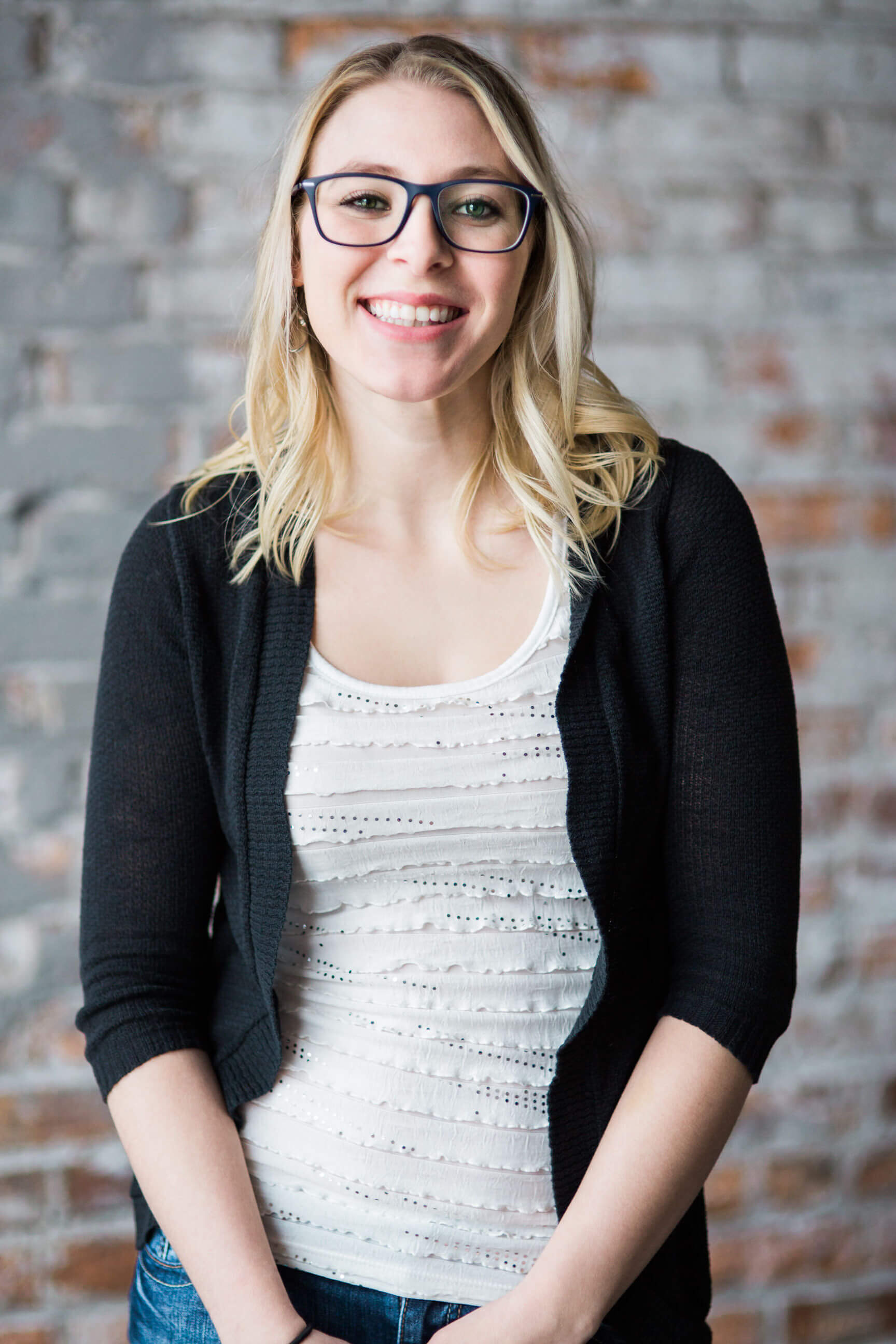 A woman employee poses for her Missoula headshot