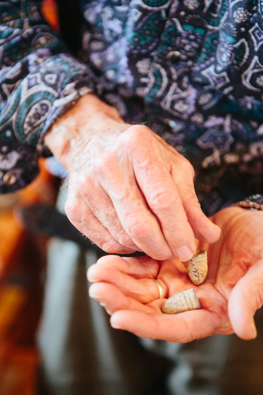 James Lee Burke holds Civil War bullets in his hand at his home in Lolo Montana