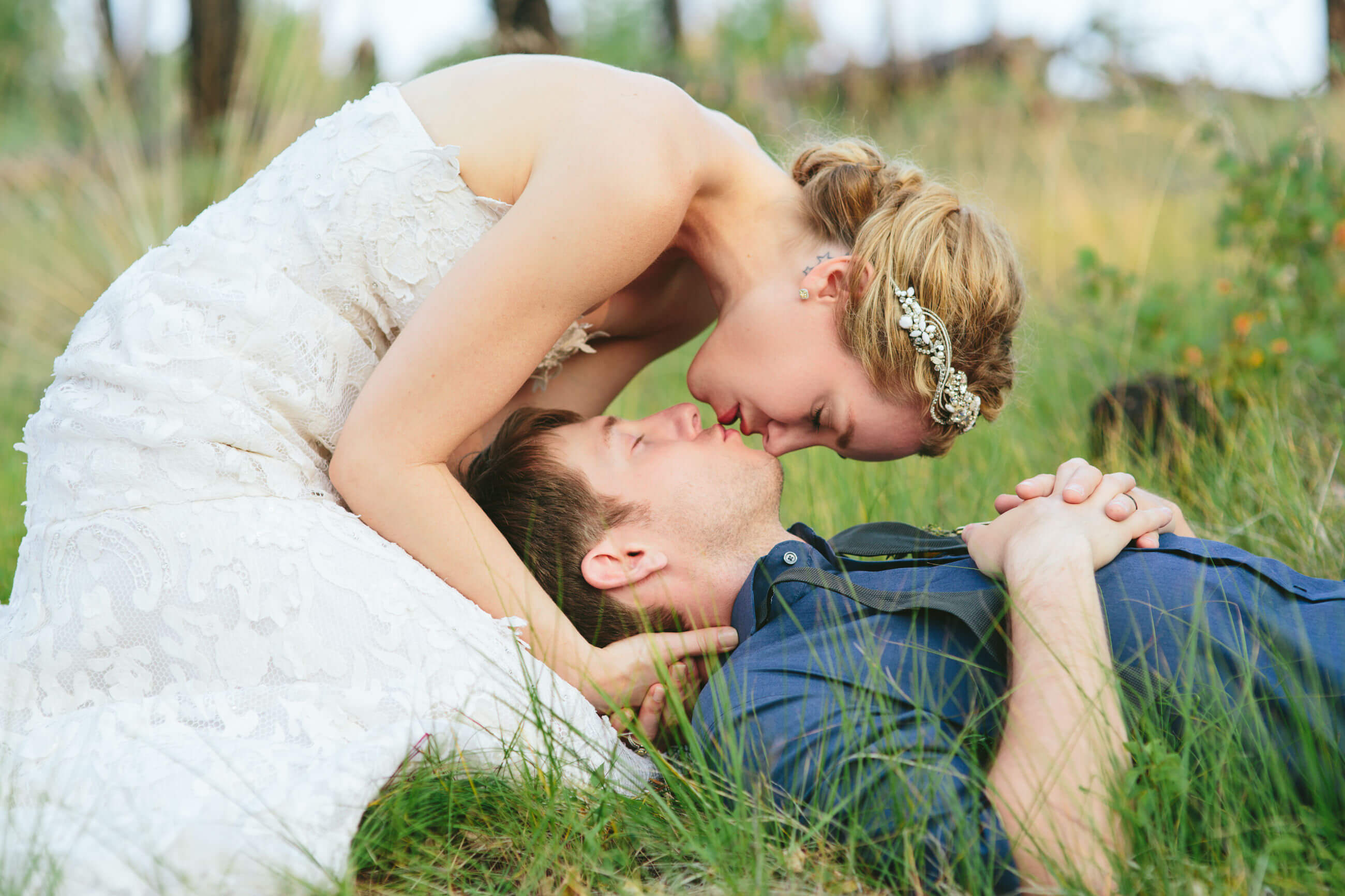 A bride kisses her new husband during their rock the dress photos in Missoula Montana