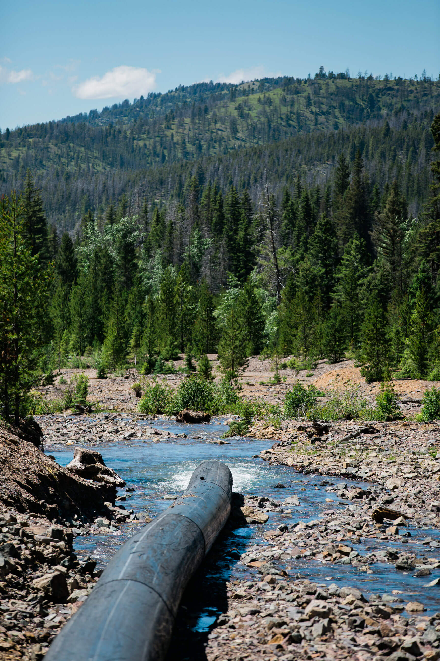 A pipe empties water into a stream in Montana