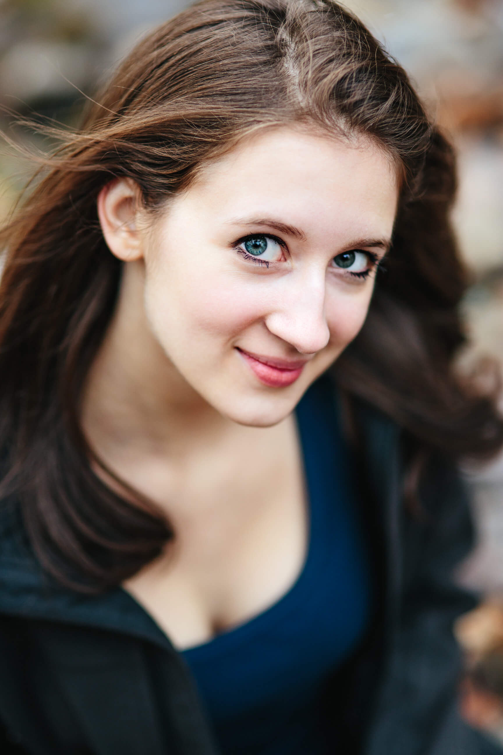 A senior girl looks at the camera during her Missoula senior photos