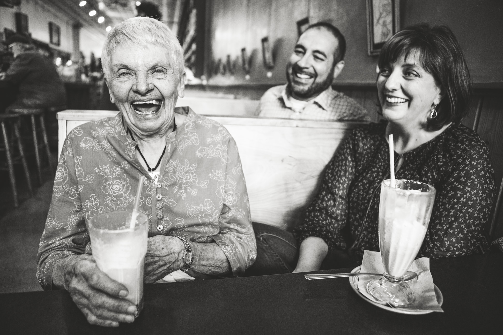 A grandmother and her family enjoy milkshakes at Butterfly Herbs in Missoula Montana