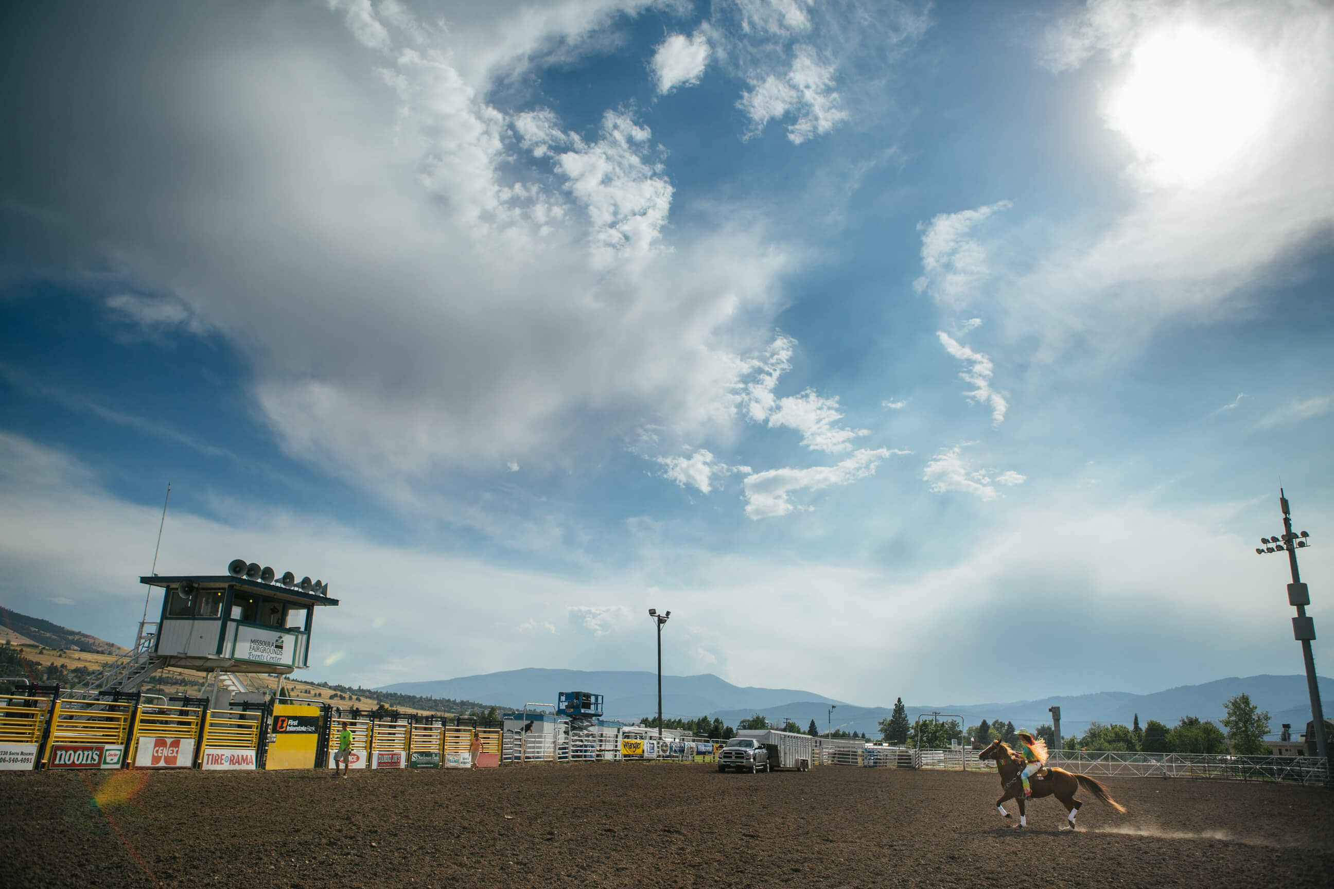 Fallon Taylor rides her horse across a barrel racing arena in Missoula Montana
