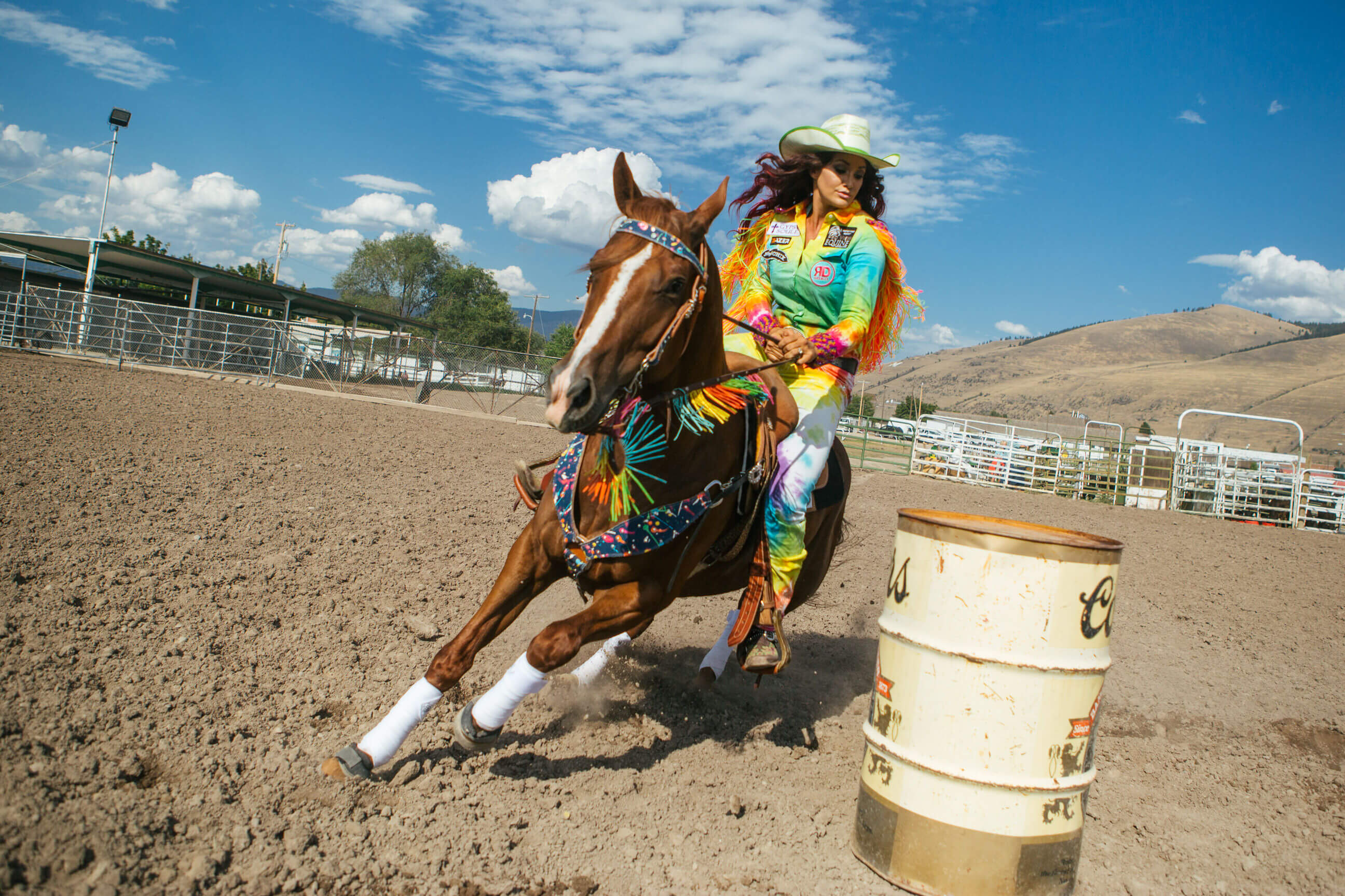 Fallon Taylor rides her horse Duty around a barrel in Missoula Montana