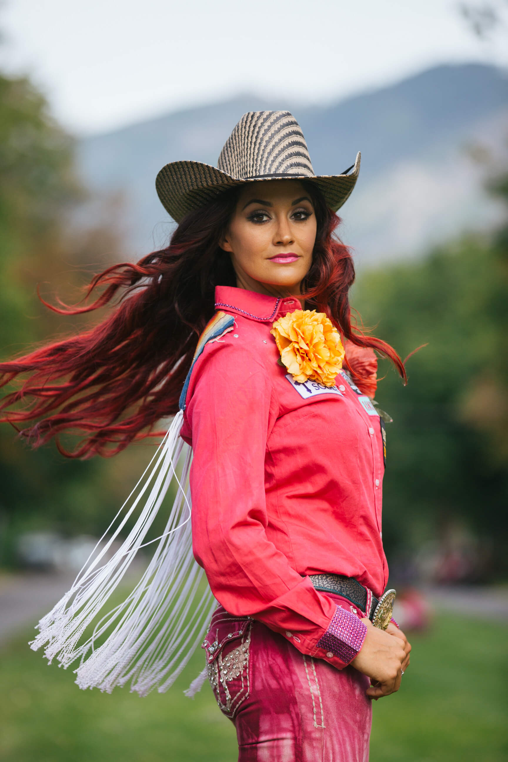 Fallon Taylor tosses her hair and fringe during a cover photo shoot for Western Horse & Gun magazine in Missoula Montana